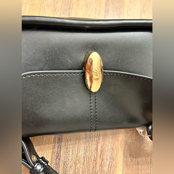 Black mini purse. Gold hardware. Never used. - Picture 2 of 4